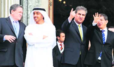 Special Representative for Afghanistan and Pakistan Richard Holbrooke, Foreign Minister of the UAE Sheikh Abdullah bin Zayed Al Nahyan, Pakistani Foreign Minister Shah Mahmood Qureshi and Turkish Foreign Minister Ahmet Davutoglu pose to the media after a meeting in Istanbul 