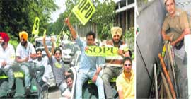 Members of SOPU take part in an election rally; and (right) securityman shows sticks and rods seized during a checking at Panjab University in Chandigarh