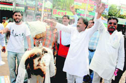 Members of the All-India Janata Party (Secular) protest over the central varsity issue in Jammu on Wednesday.