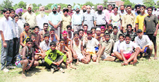 Winning teams of school games with the chief guest Gurjinder Singh Grewal in Amloh on Wednesday. 