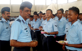 Air Marshal NAK Browne interacting with Air Force personnel at Air Force Station, Bhisiana.