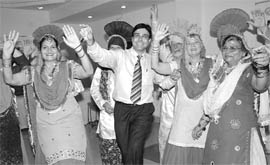 Dr Manuj Wadhwa performs bhangra during a knee replacement programme in Patiala on Thursday.