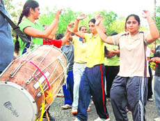 Students celebrate at Punjabi University, Patiala, on Thursday after the university won MAKA Trophy.