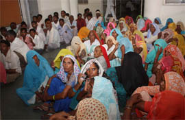 Residents of Abhay Pur village stage a dharna after two groups clashed at the deputy commissioners office in Gurgaon on Thursday.