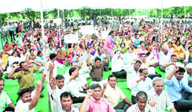 Teachers of various colleges and universities raise slogans on the Maharshi Dayanand University campus in Rohtak on Thursday. 