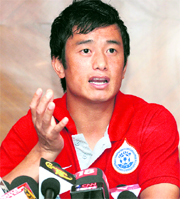 Indian football team captain and president of the Football Players Association of India Baichung Bhutia addresses mediapersons after the launch of associations website in New Delhi on Thursday.