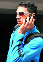 Yuvraj Singh attends a phone call during the four-day training camp that began in Bangalore on Thursday.