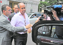 Hassan Nemazee exits Manhattan federal court in New York on Wednesday.