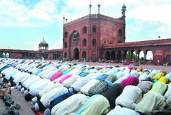 Muslim devotees offer the first Friday namaz during Ramzan at Jama Masjid on Friday.