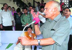 Education minister ID Dhiman addressing the audience after inaugurating a hockey tournament at Hamirpur 