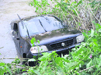 The Alto car that fell into the canal at Raul village near Gurthali bridge of Doraha on Friday.