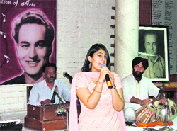 A singer performs at a programme in memory of Mukesh in Ludhiana. 