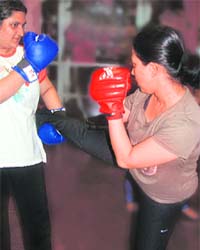 STAYING FIT: Young professionals are regularly practising kickboxing in Mumbai