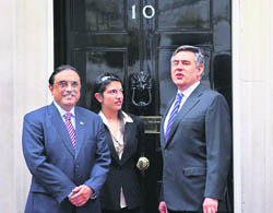 British Prime Minister Gordon Brown (right) accompanied by Pakistans President Asif Ali Zardari and his daughter Asifa Bhutto Zardari pose for the photographers prior to their meeting at his official residence at 10 Downing Street on Friday.