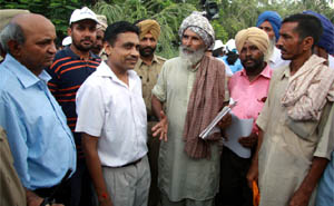 DIG Jitender Jain listens to problems of residents during the launch of the Naya Savera Abhiyan at Lehra Mohabbat in Bathinda district on Saturday.