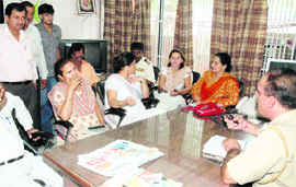 The parents of the missing children and the school staff at Industrial Area, Phase I, police station on Saturday.