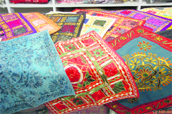 Colourful cushions on display in a store in Dehradun