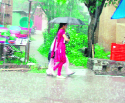 The Kangra valley experienced heavy rains on Saturday afternoon, throwing life out of gear.