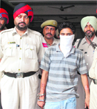 Gurinder Singh Gaggi in police custody. 