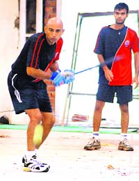 Amay Khurasia of Indian Revenue practices in an indoor facility at PCA Stadium, Mohali