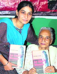 Inderjit Kaur Sandhu, former Vice-Chancellor, Punjabi University, Patiala, releases Amarinder Sandhus book in Chandigarh