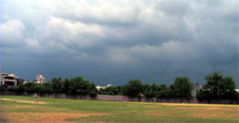 A thick cover of clouds covered the city skies before heavy showers on Sunday.