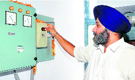Deputy Chief Minister Sukhbir Badal inaugurates a water supply project at Bahmniwala village in Jalalabad subdivision on Sunday.