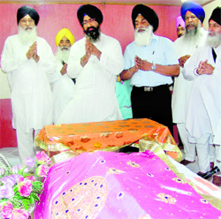 Chief Minister Parkash Singh Badal at the bhog of the akhand path organised by him at the Golden Temple premises in Amritsar on Sunday.