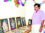 Sanjeev Kalra with paintings of Lord Ganesha at his house in Sirsa 