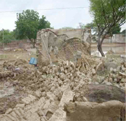 Rain water damaged even pucca houses and affected wheat stocks in different parts of Hanumangarh district on Monday. 