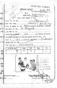 The building owned by the family of Mohammad Saleem Khan at Budhanpur village in Panchkula and  a photocopy of the BPL card issued to him.