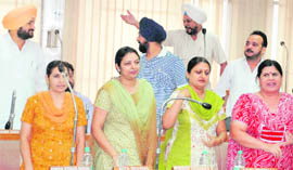 Councillors demand an inquiry against officials of the market committee during a House meeting in Chandigarh on Monday. 
