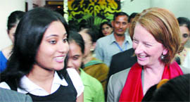 Australian Deputy Prime Minister Julia Gillard with a student during an interaction session at Lady Sri Ram College in New Delhi on Monday. 