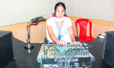 Uma Chaudhary, a student of Journalism and Mass Communication, gives a programme on the recently set up FM radio on the CDLU campus in Sirsa.