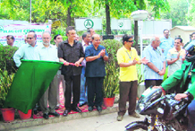 Former Union Minister Karan Singh flags off a National Motorbike Expedition from New Delhi.