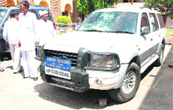 BSP leader Man Singh Manheras damaged vehicle parked outside Panchayat Bhawan in Hisar on Monday.