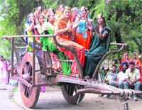 Girls sing a song Punjabi folk song sitting on a gadda