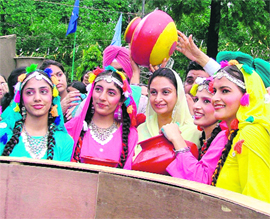 MP Harsimrat Kaur Badal with participants of Virasati Mela Dhiyan Da in Ludhiana on Monday.