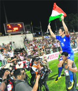 Indian captain Bhaichung Bhutia celebrates after defeating Syria in the Nehru Cup final in New Delhi on Monday. India won 5-4 on penalties to clinch their second successive Nehru Cup title, thanks to goalkeeper Subrata Paul who saved three spot kicks in the shootout. 