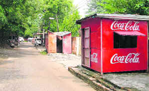 Shelters outside houses of govenment officials on public land.