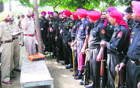 A police official gives tips to a patrolling party at Ahmedgarh on Wednesday.