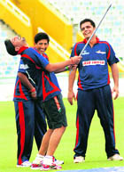Harbhajan Singh caught in a light moment with teammates after the match between Indian Revenue and Air India Blue for the BCCI Corporate Cup had to be put off for a short while due to bad weather at the PCA Stadium, Mohali, on Thursday.