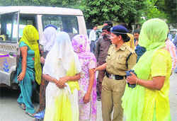 The accused in police custody in Dehradun on Thursday.