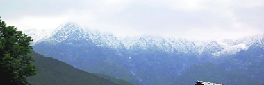 A view of the snow-covered Dhauladhar ranges in Dharamsala on Thursday.