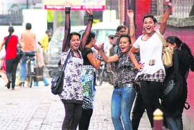 College girls in jubiliant mood following sudden showers in Ludhiana