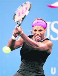 Serena Williams plays a shot during her match with Melinda Czink at the US Open