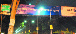 A direction tower turns into an advertising hoarding in Amritsar. 
