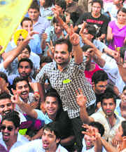 Amit Bhatia of SOPU, who was elected president of the student council, with supporters at the PU, Chandigarh, on Friday.
