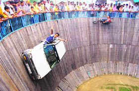 Dare devils perform in a death knell at Chhapar Mela on Friday.