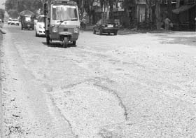 Motorists have to take a bumpy ride on this stretch of the Chandigarh-Ambala highway at Zirakpur